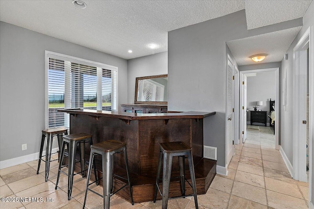 2481 S Ponte Vedra Blvd, Ponte Vedra Beach, FL 32082 - bar with a textured ceiling and recessed lighting
