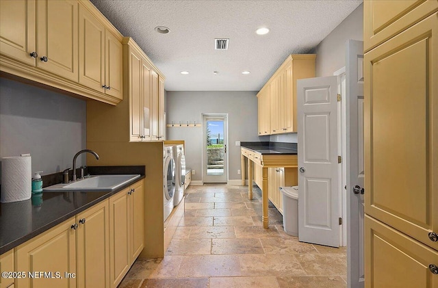 2481 S Ponte Vedra Blvd, Ponte Vedra Beach, FL 32082 - washroom with washer and clothes dryer, cabinet space, stone tile floors, a textured ceiling, and recessed lighting