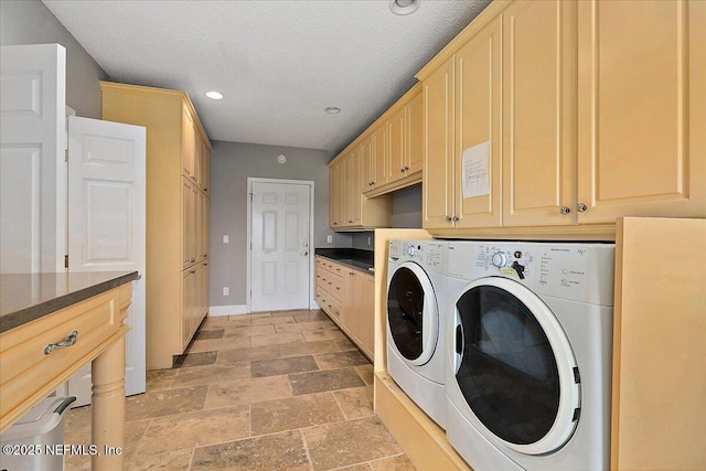 2481 S Ponte Vedra Blvd, Ponte Vedra Beach, FL 32082 - laundry room with independent washer and dryer, cabinet space, light stone finish floors, recessed lighting, and a textured ceiling