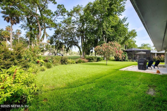 110 Abalone Ln W, Ponte Vedra Beach, FL 32082 - view of green lawn with a patio