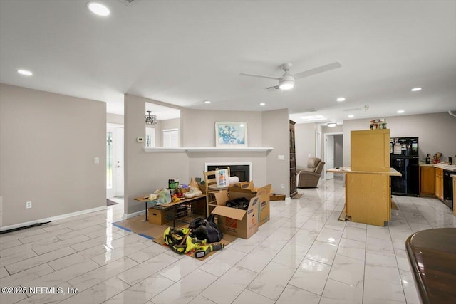 110 Abalone Ln W, Ponte Vedra Beach, FL 32082 - living area with light marble finish flooring, ceiling fan, recessed lighting, and a glass covered fireplace