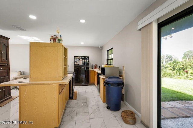 110 Abalone Ln W, Ponte Vedra Beach, FL 32082 - kitchen featuring light marble finish floors, freestanding refrigerator, stainless steel microwave, light countertops, and recessed lighting