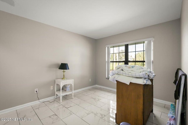 110 Abalone Ln W, Ponte Vedra Beach, FL 32082 - unfurnished bedroom featuring light marble finish flooring and baseboards