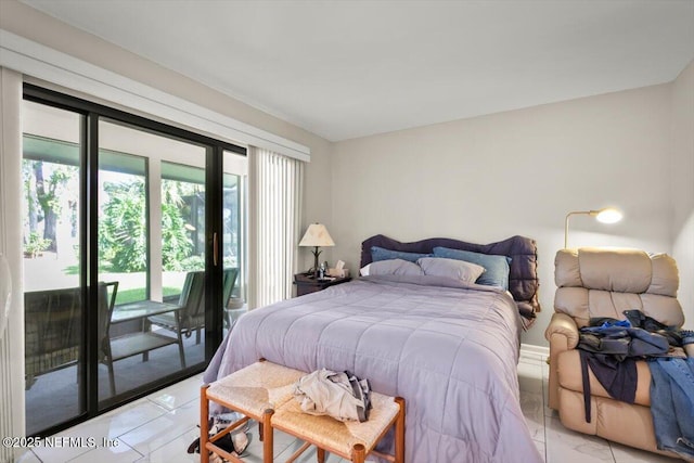 110 Abalone Ln W, Ponte Vedra Beach, FL 32082 - bedroom with access to exterior and light marble finish flooring