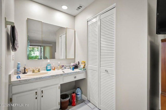 110 Abalone Ln W, Ponte Vedra Beach, FL 32082 - bathroom featuring a closet, vanity, and tile patterned flooring