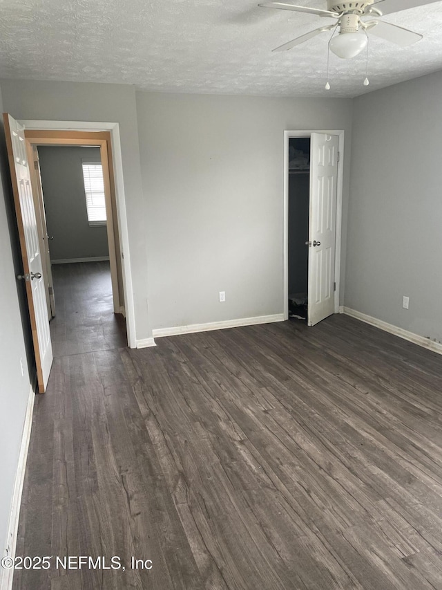 130 Gassett Rd, Saint Augustine, FL 32080 - unfurnished room with dark wood finished floors, ceiling fan, and a textured ceiling