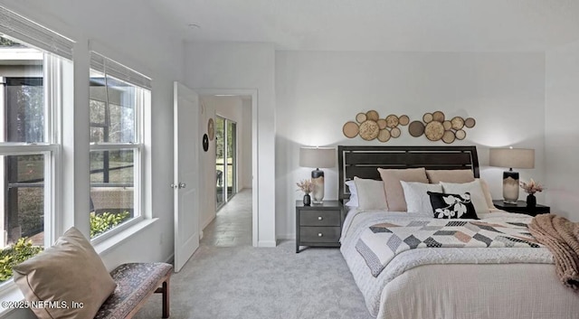 179 Charmer Trce, Saint Augustine, FL 32092 - bedroom featuring multiple windows and carpet flooring