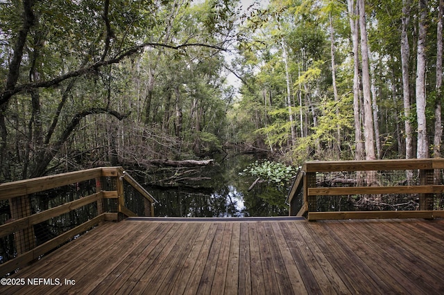179 Charmer Trce, Saint Augustine, FL 32092 - wooden deck featuring a water view and a wooded view