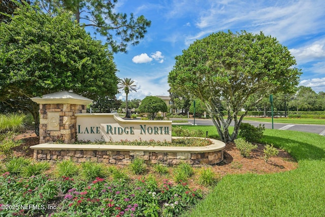1500 Calming Water Dr Unit 4504, Fleming Island, FL 32003 - community / neighborhood sign featuring a yard