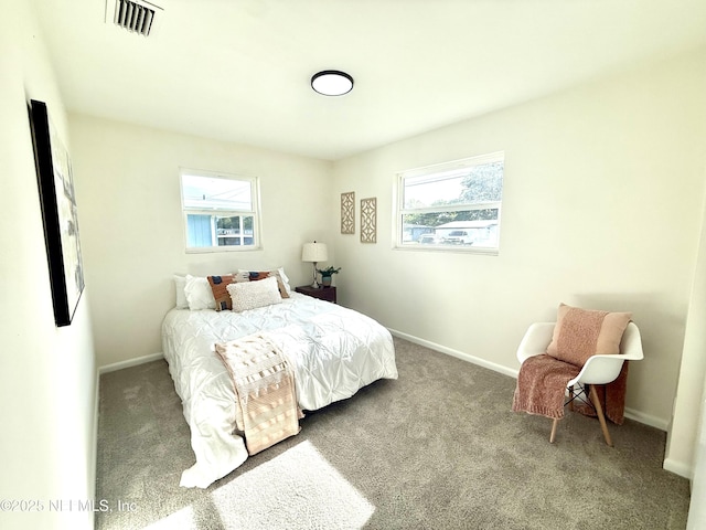 2536 Wedgefield Blvd, Jacksonville, FL 32211 - bedroom with multiple windows and carpet