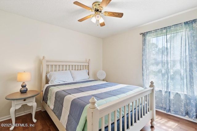 96220 Ridgewood Cir, Fernandina Beach, FL 32034 - bedroom featuring wood finished floors and a ceiling fan
