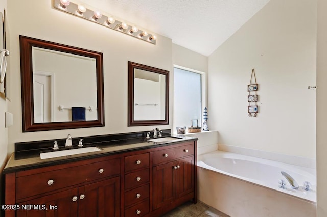 96220 Ridgewood Cir, Fernandina Beach, FL 32034 - full bathroom featuring double vanity, a bath, and vaulted ceiling