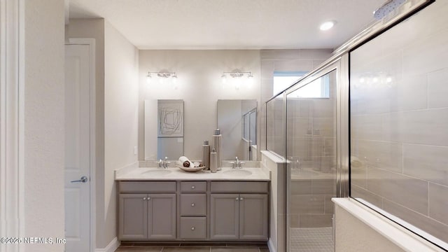 2621 Lavender Loop, Green Cove Springs, FL 32043 - full bathroom with a stall shower and double vanity