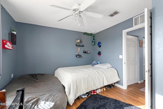 113 Oceangate Dr, Atlantic Beach, FL 32233 - bedroom with wood finished floors and ceiling fan
