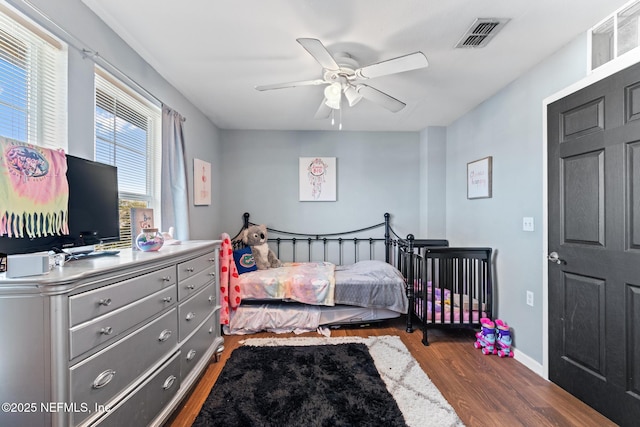 113 Oceangate Dr, Atlantic Beach, FL 32233 - bedroom featuring dark wood finished floors and ceiling fan