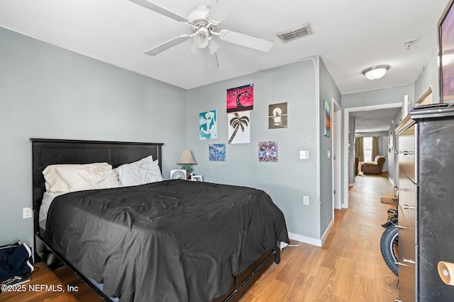 113 Oceangate Dr, Atlantic Beach, FL 32233 - bedroom featuring wood finished floors and a ceiling fan