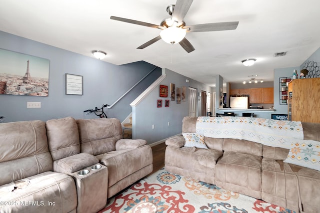 113 Oceangate Dr, Atlantic Beach, FL 32233 - living room featuring ceiling fan, stairway, and light wood-style floors