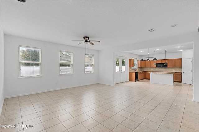 1415 Lantern Light Trl, Middleburg, FL 32068 - unfurnished living room featuring a ceiling fan, light tile patterned floors, and recessed lighting