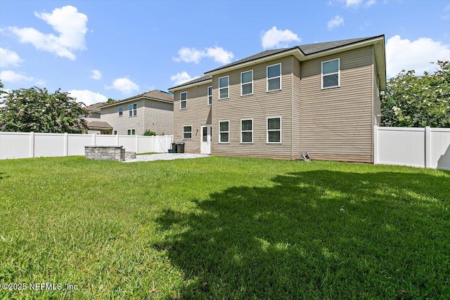 1415 Lantern Light Trl, Middleburg, FL 32068 - back of property with a patio area and a fenced backyard