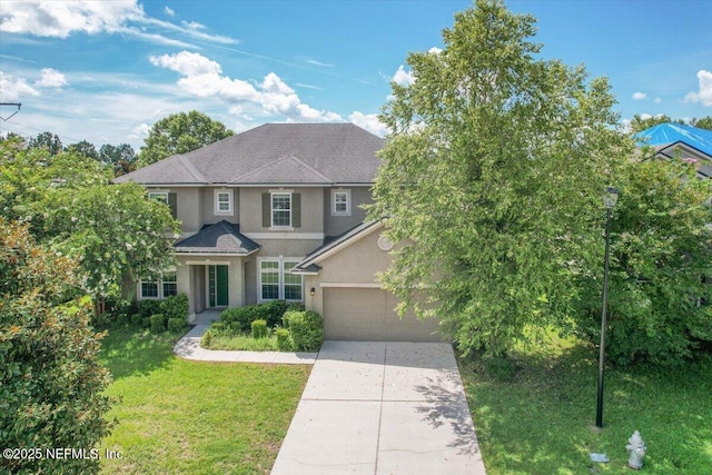 1415 Lantern Light Trl, Middleburg, FL 32068 - traditional home with stucco siding, driveway, and a front lawn