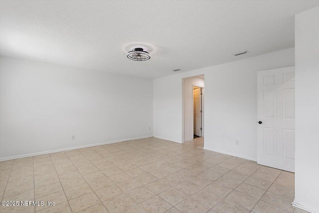 1415 Lantern Light Trl, Middleburg, FL 32068 - unfurnished room featuring a textured ceiling and baseboards