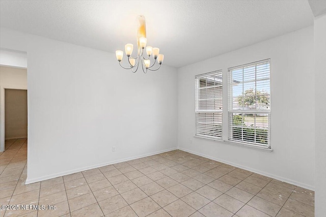 1415 Lantern Light Trl, Middleburg, FL 32068 - spare room with a chandelier and light tile patterned flooring