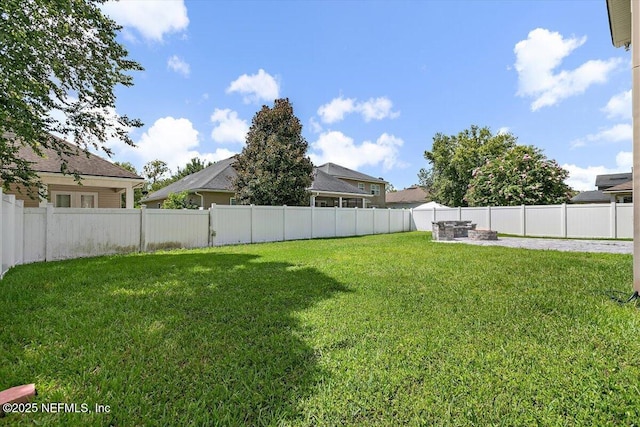 1415 Lantern Light Trl, Middleburg, FL 32068 - fenced backyard featuring a fire pit