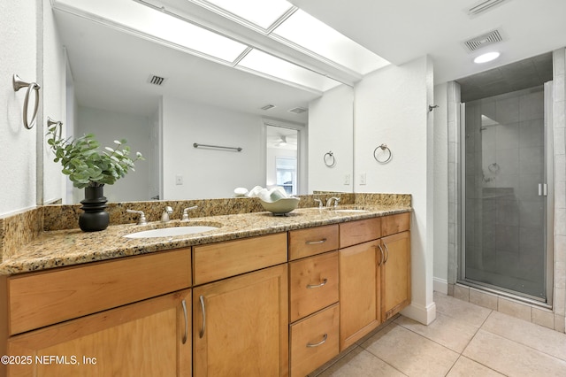 736 Tidewater Ct, Ponte Vedra Beach, FL 32082 - full bathroom with double vanity, tile patterned flooring, and a shower stall