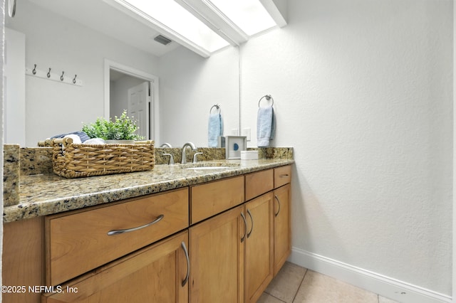 736 Tidewater Ct, Ponte Vedra Beach, FL 32082 - bathroom with tile patterned floors and vanity
