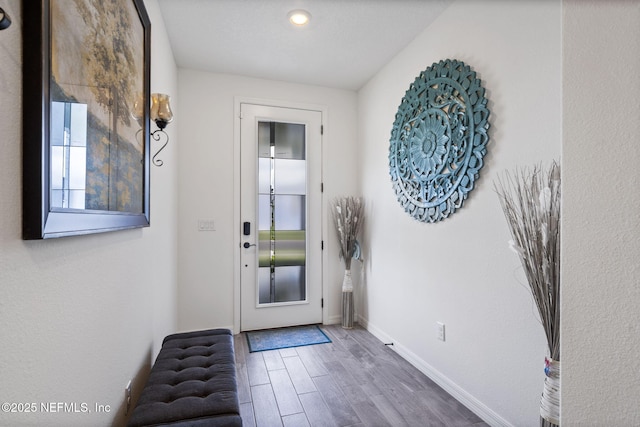 816 Blind Oak Way, Middleburg, FL 32068 - doorway to outside featuring wood finished floors and recessed lighting