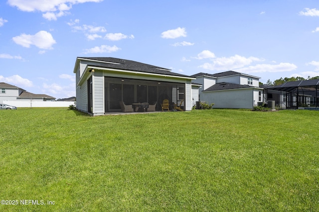 816 Blind Oak Way, Middleburg, FL 32068 - back of house featuring a lawn and a sunroom