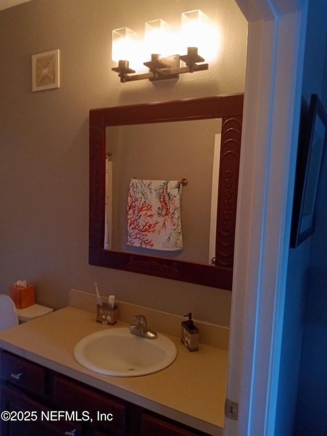 3671 Kirkpatrick Cir Unit 6, Jacksonville, FL 32210 - bathroom featuring vanity and toilet
