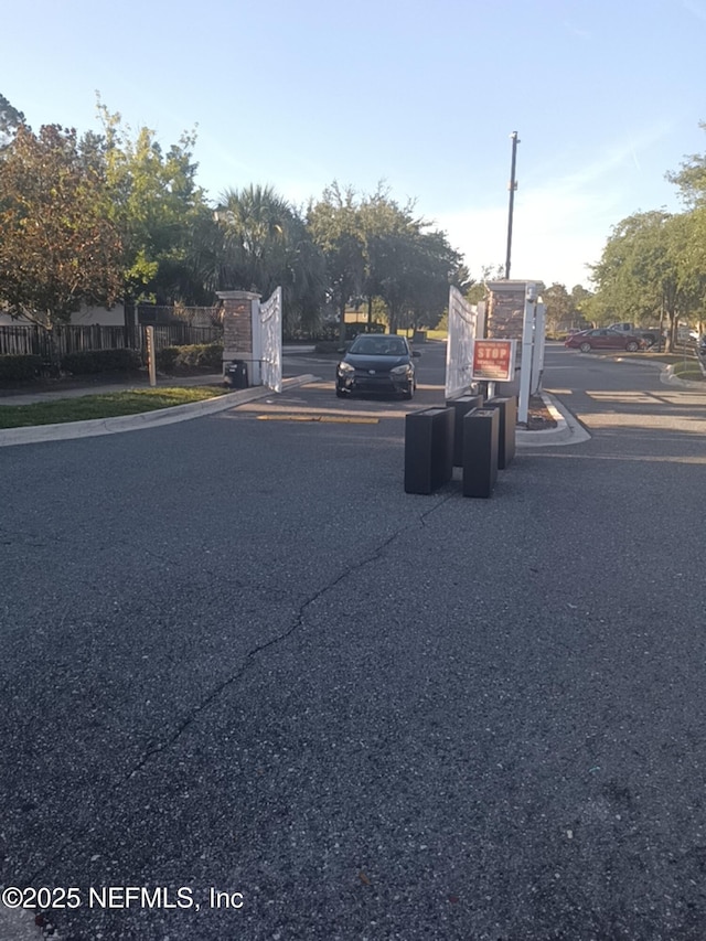 3671 Kirkpatrick Cir Unit 6, Jacksonville, FL 32210 - view of asphalt street with curbs