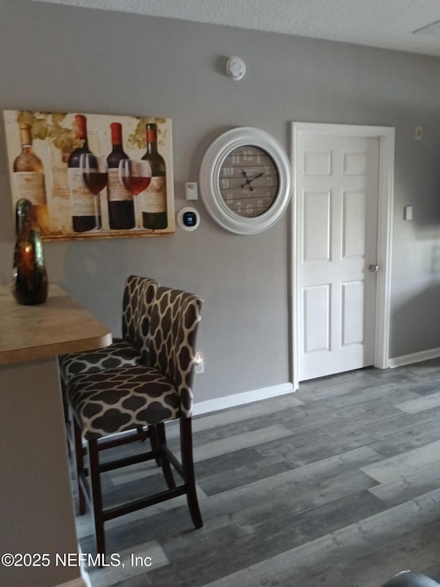 3671 Kirkpatrick Cir Unit 6, Jacksonville, FL 32210 - living area with baseboards and wood finished floors