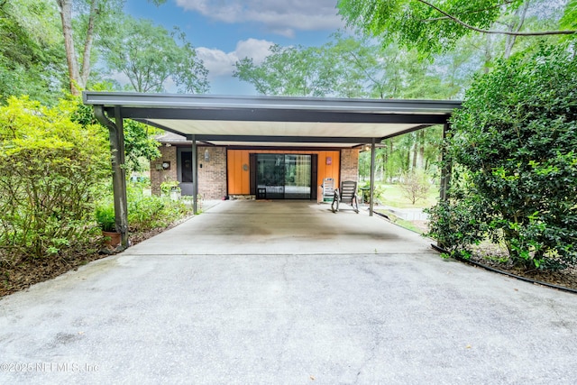 4253 Chokeberry Rd, Middleburg, FL 32068 - view of vehicle parking featuring driveway and a carport