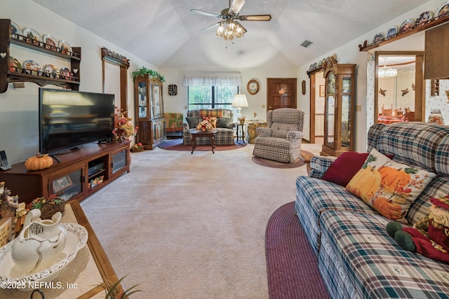 4253 Chokeberry Rd, Middleburg, FL 32068 - carpeted living area with vaulted ceiling, ceiling fan, and a textured ceiling