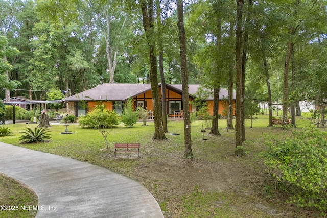 4253 Chokeberry Rd, Middleburg, FL 32068 - view of front of house with a front lawn