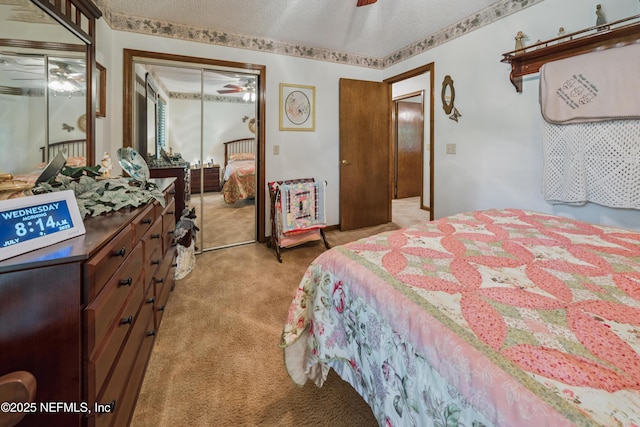 4253 Chokeberry Rd, Middleburg, FL 32068 - bedroom featuring light carpet, a closet, a textured ceiling, and ceiling fan