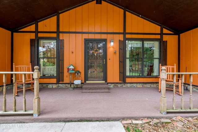 4253 Chokeberry Rd, Middleburg, FL 32068 - doorway to property featuring covered porch