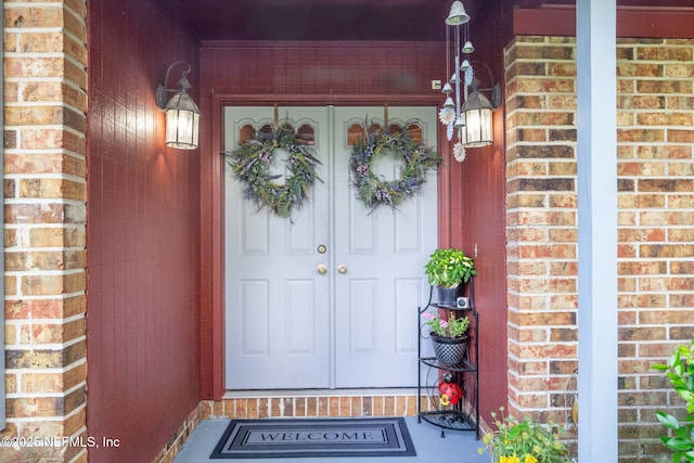4115 Wilcrest Cir W, Jacksonville, FL 32277 - view of exterior entry featuring brick siding and covered porch