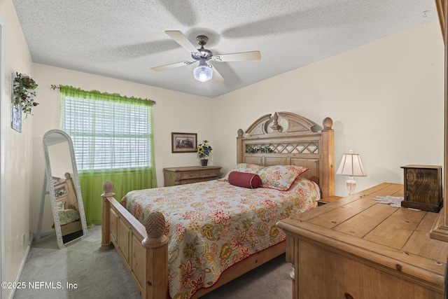 4115 Wilcrest Cir W, Jacksonville, FL 32277 - bedroom featuring light carpet, a textured ceiling, and ceiling fan