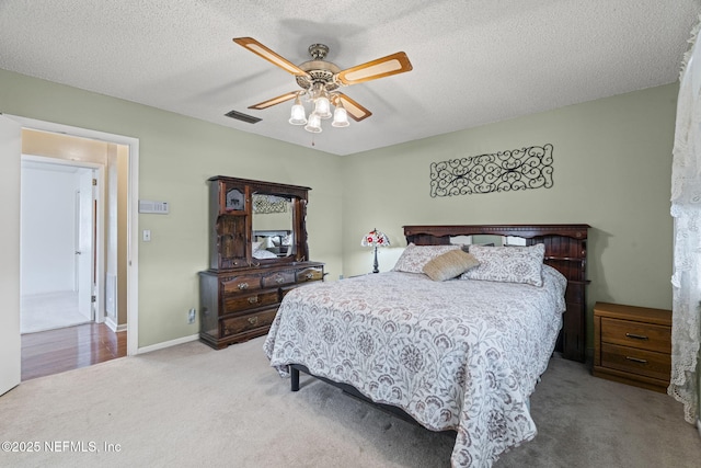 4115 Wilcrest Cir W, Jacksonville, FL 32277 - bedroom with carpet flooring, a ceiling fan, and a textured ceiling