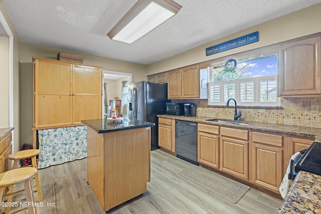 4115 Wilcrest Cir W, Jacksonville, FL 32277 - kitchen with dishwasher, a center island, stone counters, tasteful backsplash, and a textured ceiling