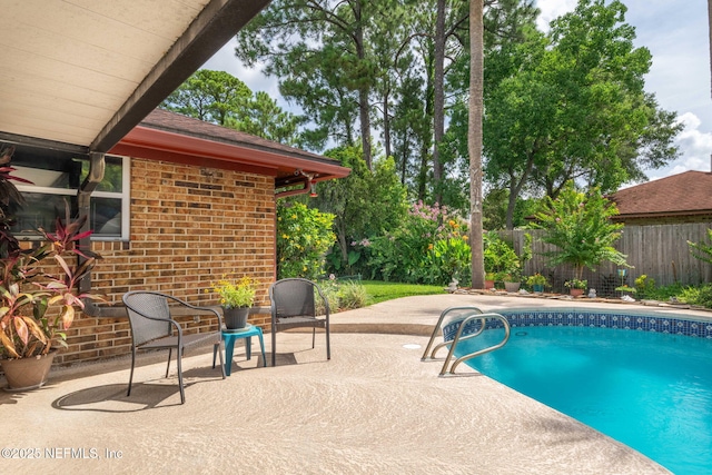 4115 Wilcrest Cir W, Jacksonville, FL 32277 - view of swimming pool with a patio