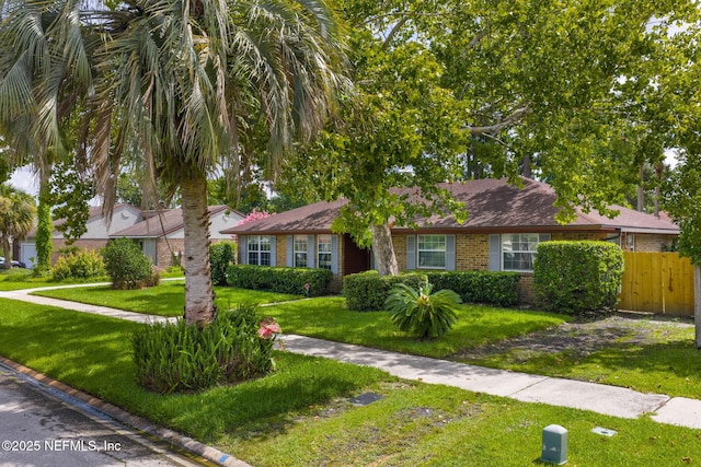 4115 Wilcrest Cir W, Jacksonville, FL 32277 - ranch-style home with brick siding