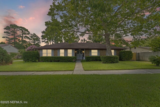 4115 Wilcrest Cir W, Jacksonville, FL 32277 - ranch-style house featuring brick siding