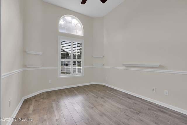 1506 Waterbridge Ct, Fleming Island, FL 32003 - spare room with ceiling fan and wood finished floors