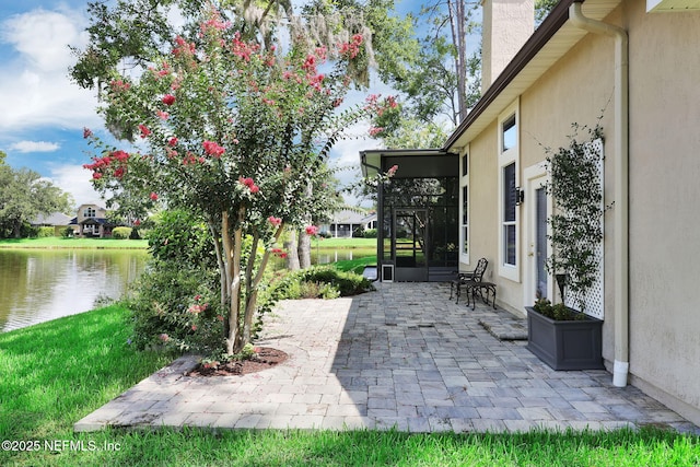 1506 Waterbridge Ct, Fleming Island, FL 32003 - view of patio / terrace with a water view