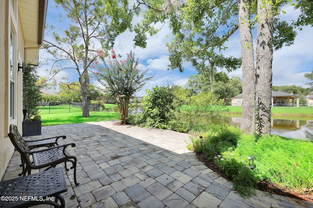 1506 Waterbridge Ct, Fleming Island, FL 32003 - view of patio with a water view