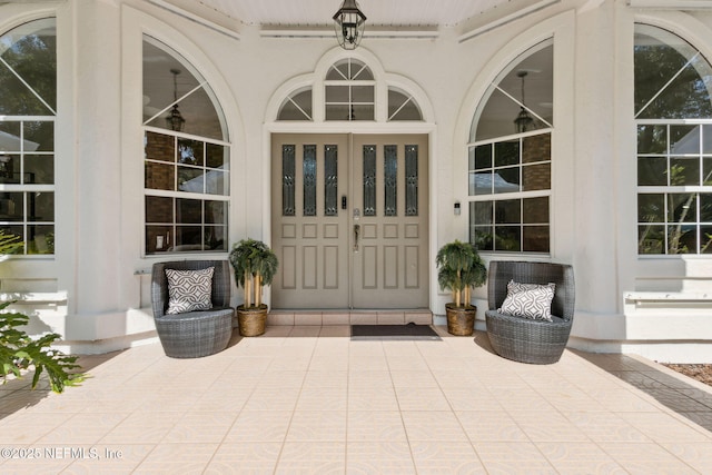 1465 Lambert Ave, Flagler Beach, FL 32136 - view of exterior entry with covered porch